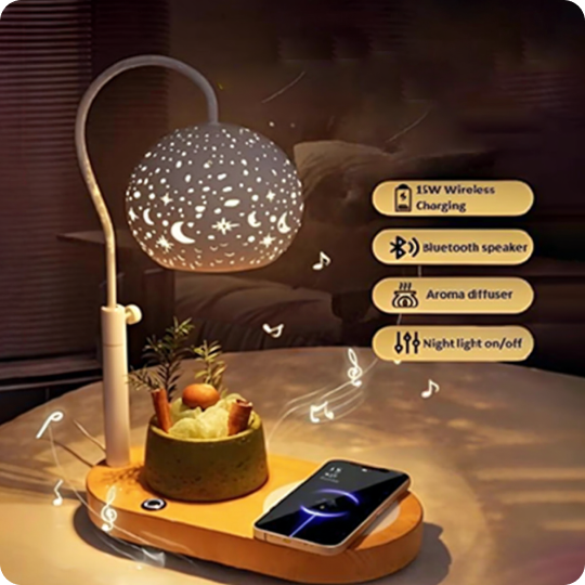 Starry night light lamp speaker illuminating a warm star projection beside a charging smartphone.