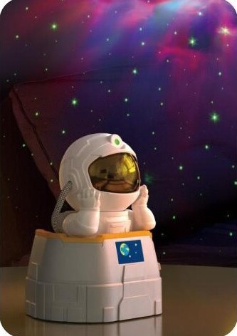 White astronaut figurine Projection Lamp sitting on a display base with reflective golden visor lens.