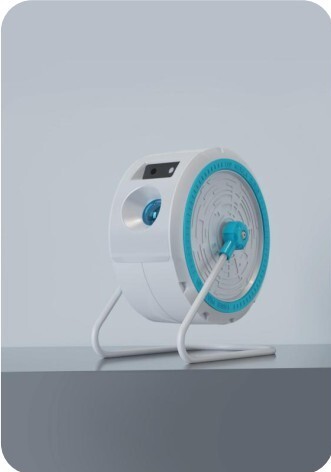 White circular Sky Projector with a blue wheel base frame sitting on a tabletop.